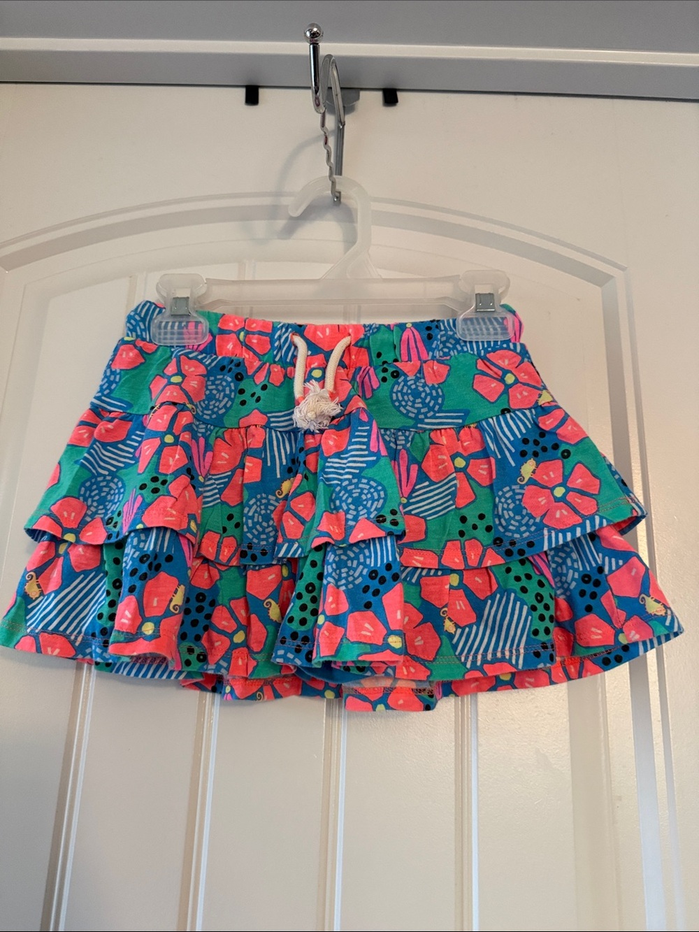 Gently worn Cat & Jack Teal and Coral Floral Ruffle Skort